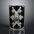 Classic Metal Sculpture With Symmetrical Patterns And Central Circular Ornament