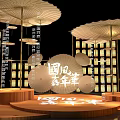 Chinese Style Carnival Stage with Wooden Platforms Lantern Backdrops and Umbrella Shaped Decor