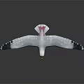 White Seagull With Spreading Wings Black Wing Tips And Yellow Beak In Flight