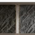 Textured Rock Background Wall With Vertical Divider And Warm Lighting On Wooden Floor