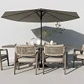 Outdoor Table and Chair Set with Rattan Chairs Wooden Table Large Umbrella and Green Plants