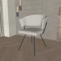 Modern Accent Chair With Curved Backrest And Metal Legs In Herringbone Wood Floor Interior