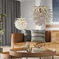 Modern Pendant Lights In Living Room Interior With Orange Sofa And Coffee Table