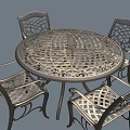 Round Metal Outdoor Table With Four Intricate Cutout Design Chairs For Patio Garden Use