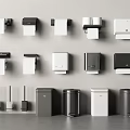 Modern Bathroom Accessories Collection With Wall Mounted Toilet Paper Holders And Freestanding Trash Bins