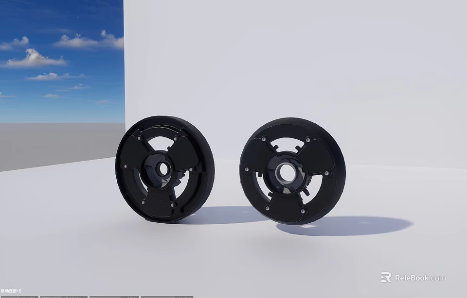 Two Black Circular Stove Components Against White Wall And Blue Sky 3d model 