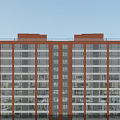 Aerial Planning High Rise Residential Building Red Brick Exterior Glass Curtain Walls Blue Sky Greenery