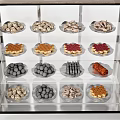 Delicious Assorted Foods Showcased on Multiple Shelves in Glass Case