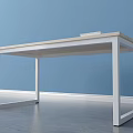 Light Wooden Top Desk With White Frame And Stack Of Books In Blue Wall Room
