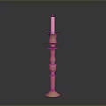Elegant Brass Candle Holder Stand With Lit White Candle And Detailed Design