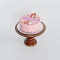 Round Pink Happy Birthday Cake With Floral Decorations On Wooden Stand