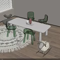 White Kids Table With Green Chairs Round Patterned Rug And Stuffed Toys