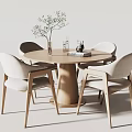 Minimalist Light Wood Round Dining Table Set with Four Upholstered Chairs and Green Plant Vase