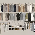 Fashionable Clothing Hanging on Hangers with Various Styles Dresses Tops and Neutral Tones