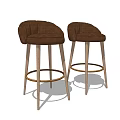 Brown Upholstered Bar Stools With Wooden Legs And Gold Ring Footrest