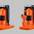 Two Orange Industrial Hydraulic Jacks With Black Components And Spring Mechanism