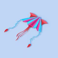 Colorful Pink And Blue Kite With Red Tails On Light Blue Background