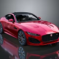 Red Jaguar Convertible Sports Car With Sleek Body And Black Roof