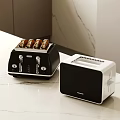 Modern Kitchen Appliances Black Toaster with Toasted Bread and White Oven on Marble Countertop