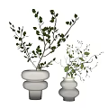 Two White Ceramic Vases With Layered Rounded Design Holding Green Foliage Branches 3d model
