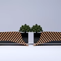 Outdoor Chair With Brown And Black Striped Design And Green Plants For Garden Use