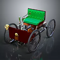 Vintage Four Wheeled Vehicle With Green Upholstered Seat Red Body And Golden Accents