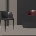 Modern Black and Red Leather Dining Chairs in Minimalist Gray Wall Background