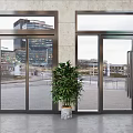 Modern Glass Entrance Doors With Metal Frames And Urban View