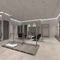 Modern Clothing Store Interior With Metal Display Racks And White Shelving Units