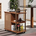 Wooden Rolling Side Table With Multiple Shelves Holding Books Wine Bottles And Decorations