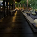 Tranquil Courtyard Garden With Lush Trees Open Seating And Warm Lighting
