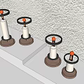 Decorative Ornament Set with Glass Covered Candle Holders Wooden Bases on Light Colored Shelf