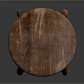 Rustic Wooden Stool With Round Seat Four Legs And Natural Wood Grain Design