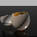 Cracked Eggshell With Yellow Yolk On Black Background For Food