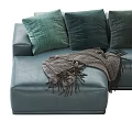 Dark Green Leather Sectional Sofa With Plush Cushions And Throw Blanket 3d model