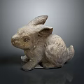 Detailed Sitting Rabbit Sculpture With Textured Surface And Natural Stone Finish