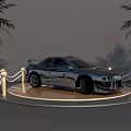 Sporty Modified Car With Large Tires Round Headlights Roof Spoiler And Green Racing Seats