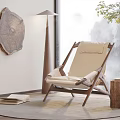 Comfortable Lounge Chair with Wooden Frame Beige Cushion by Window Natural View and Floor Lamp