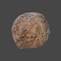Round Brown Food Item With Cracked Textured Surface And Natural Organic Look