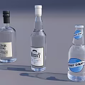 Different Types of Beverage Bottles Including Tequila Reposado Whisky and Mineral Water