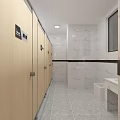 Public Toilet Exterior View With Beige Walls Front Green Shrubs Against Urban Tall Buildings