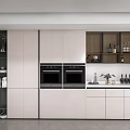 Modern Kitchen Interior With White Cabinets Black Ovens And Glass Door Storage
