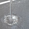 Water Fountain Design Featuring Flowing Water And Vertical Jet Spray Structures