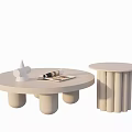 Round Coffee Table With Cylindrical Legs Decorative Item And Magazine Alongside Small Round Side Table 3d model