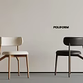 Poliform Modern Design Chairs With White And Black Seats And Wooden Legs