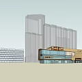 Modern Tall Residential Building with Glass Facades and Adjacent Low Rise Structures