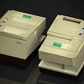 Two Old IBM Computer Printers With Green Labels And Paper Trays 3d model