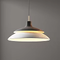 Modern Minimalist Two Tiered Chandelier With Black And White Shades And Warm Light