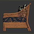 Orange Rattan Two Seater Sofa With Blue Cushions And Leaf Patterned Pillows