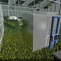 Industrial Factory Building with Glass Facade in Green Outdoor Area Under Blue Sky and Clouds